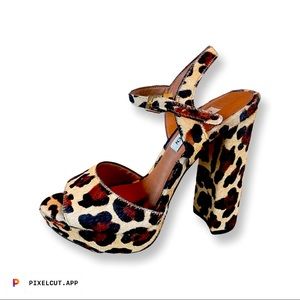 AMAZING Steve Madden cheetah print pony hair plat form Mary Jane heels. Size 7.